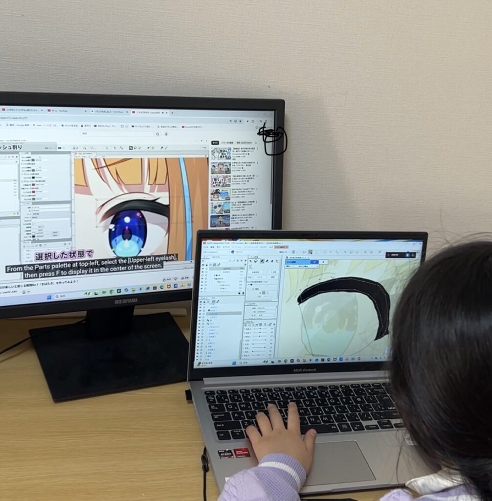 ライブ２Dでアバター作成する小学生